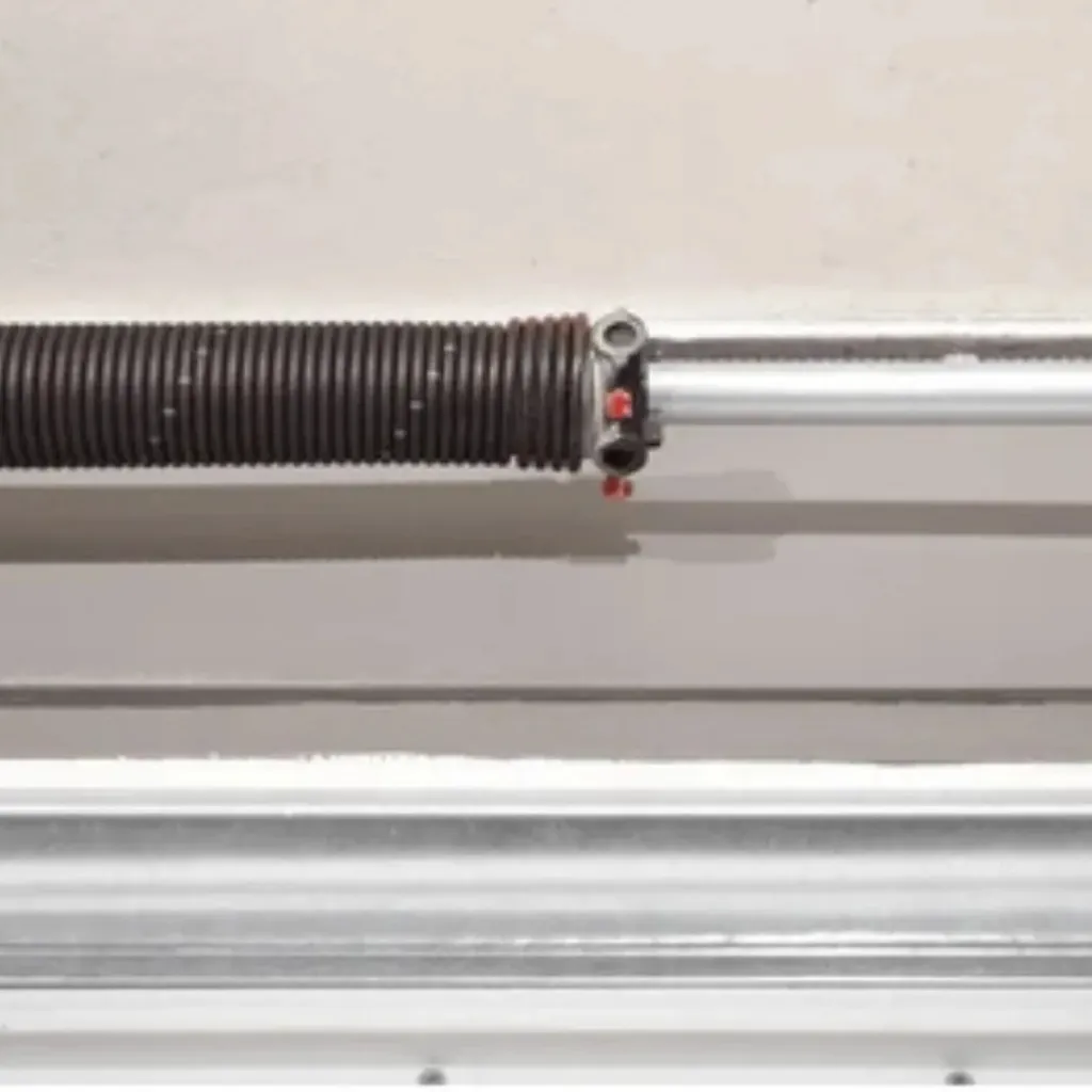 Close-up of a broken garage door torsion spring iSummerlin, NV